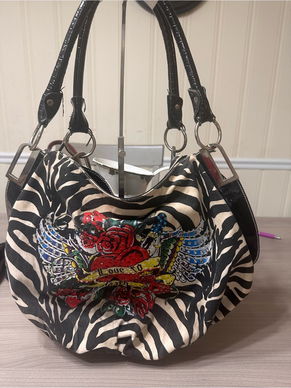 Source Unknown Zebra-Print Shoulder Bag with Winged Rose Motif - Black & Cream